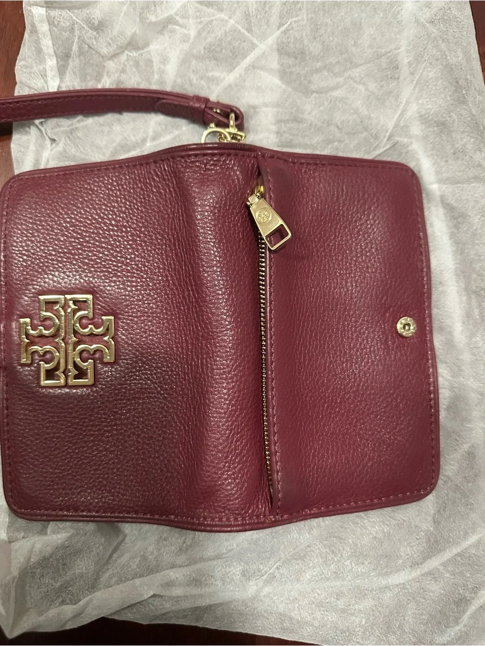 Tory Burch Pebbled Leather Wristlet in Deep Burgundy with Gold Logo